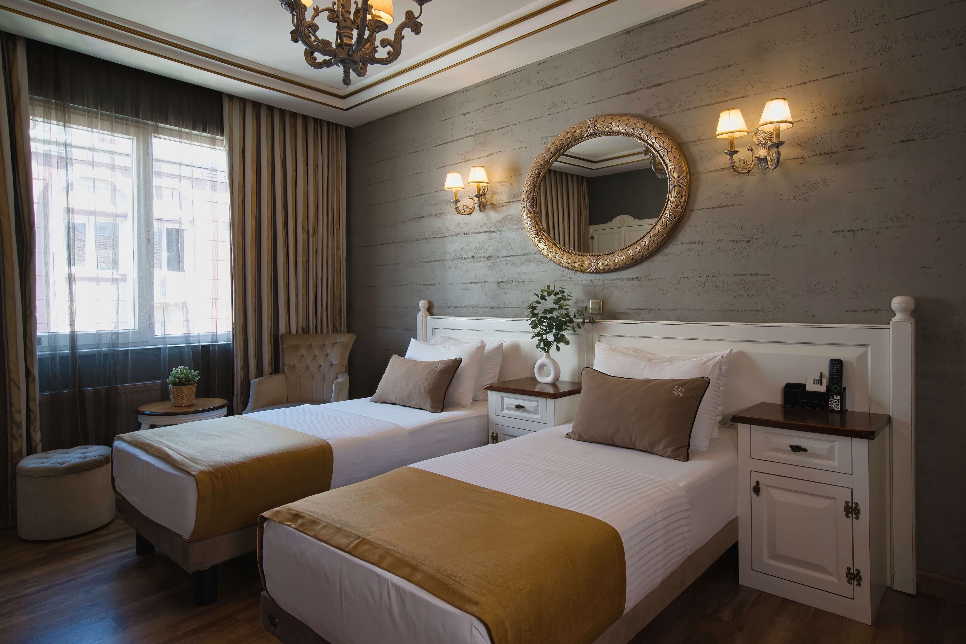 Suite: spacious bedroom with classic gold accents