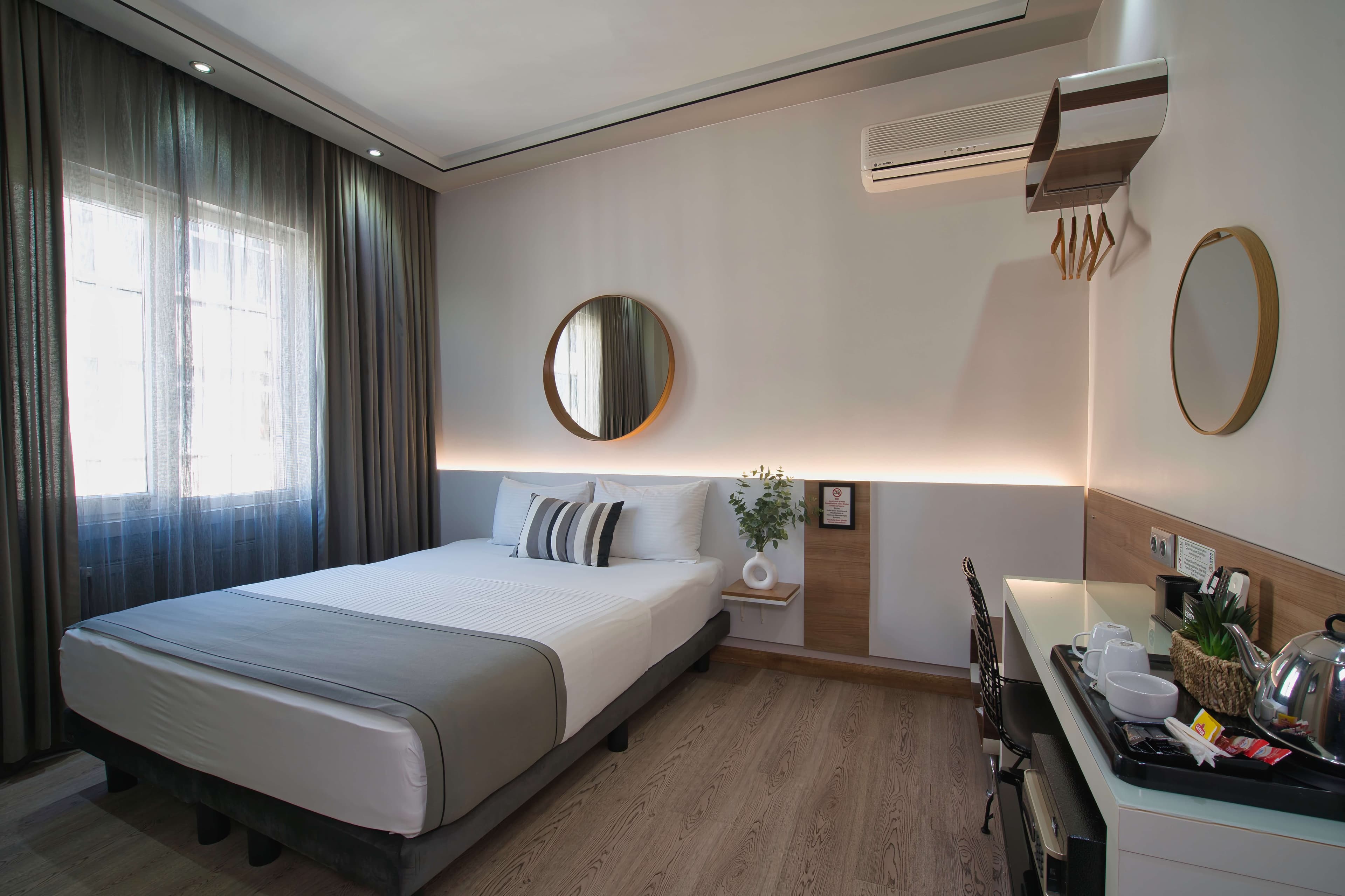 Standard double: bright bedroom with double bed